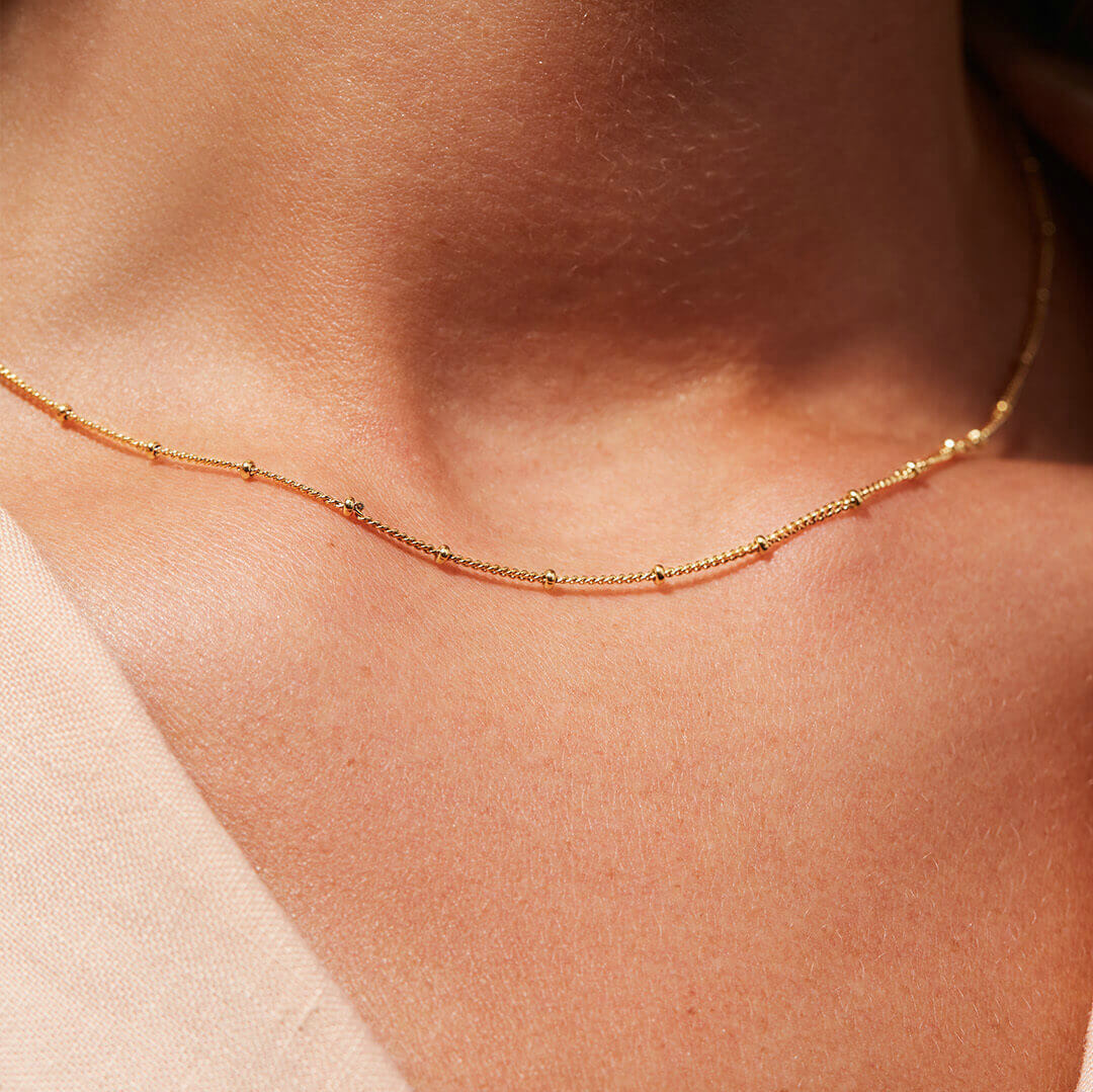 Elegant Gold Beaded Chain Necklace