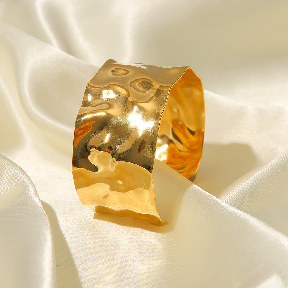 Radiant Intertwined Gold Bangle