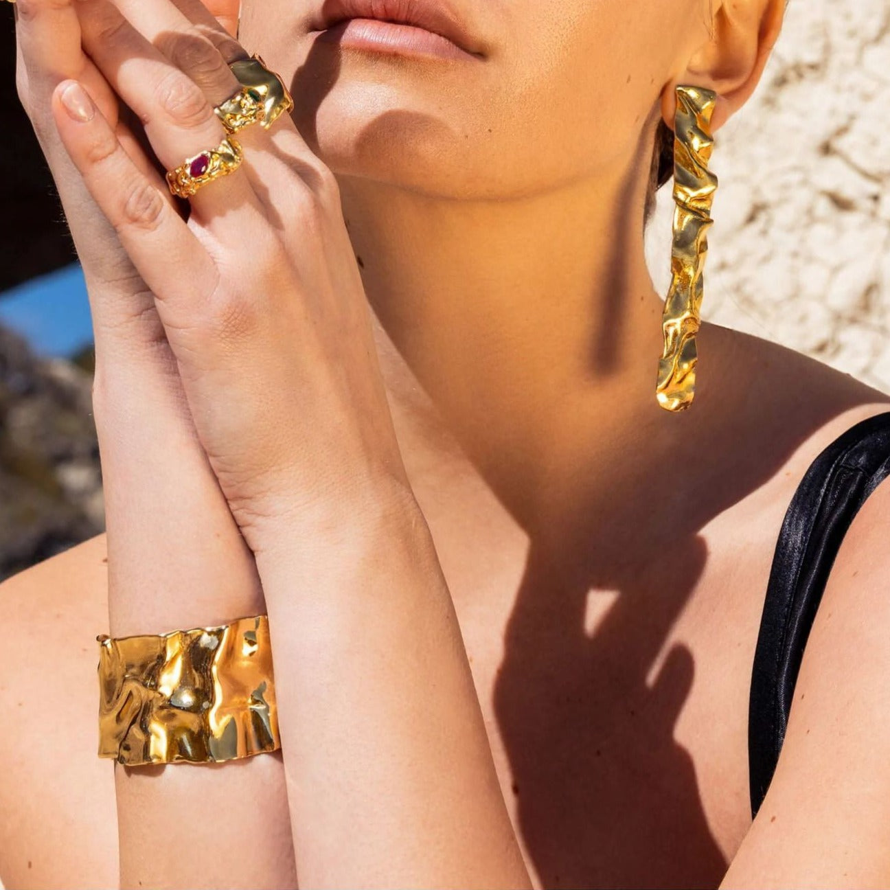 Radiant Intertwined Gold Bangle