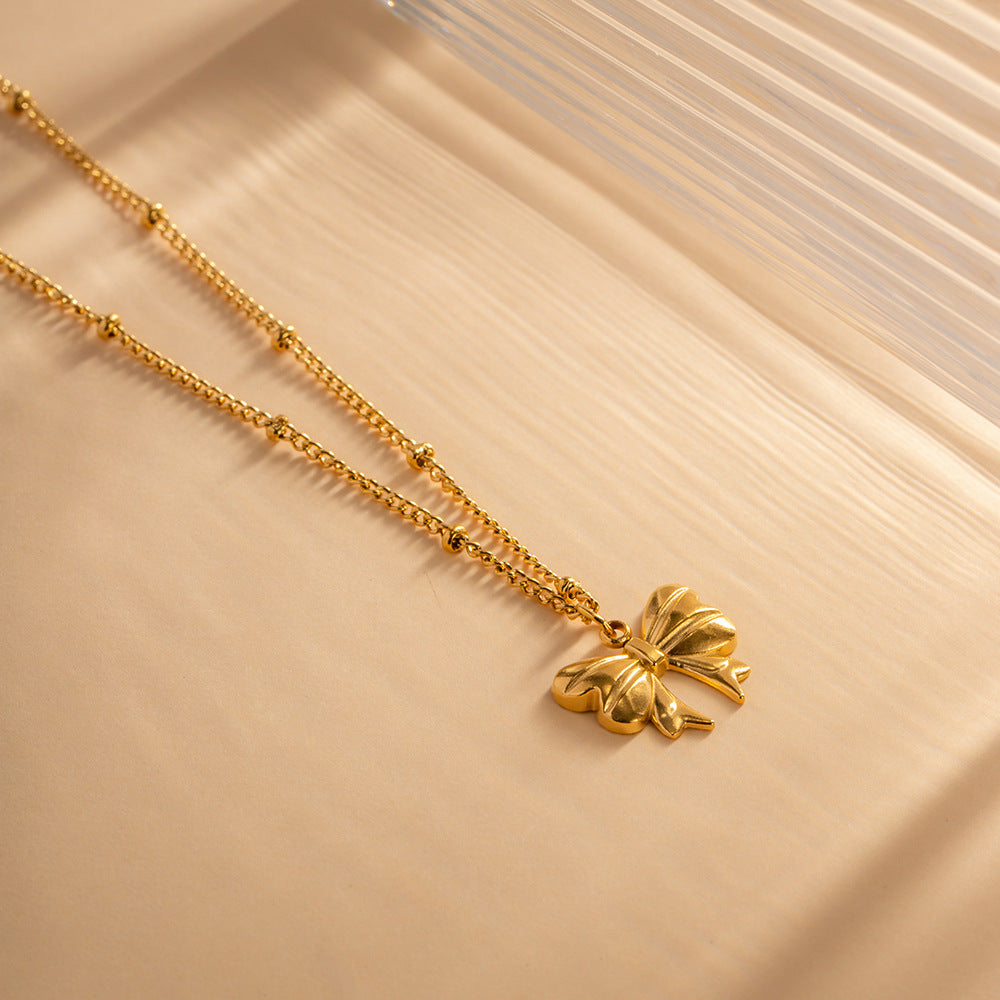Elegant Ribbon Gold Necklace