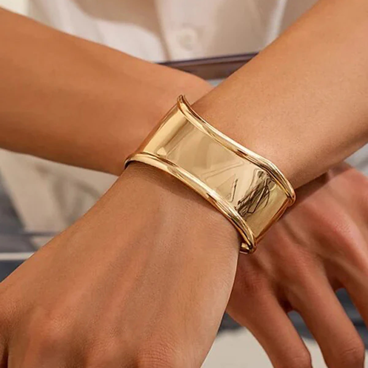 Sculptural Gold Wave Cuff