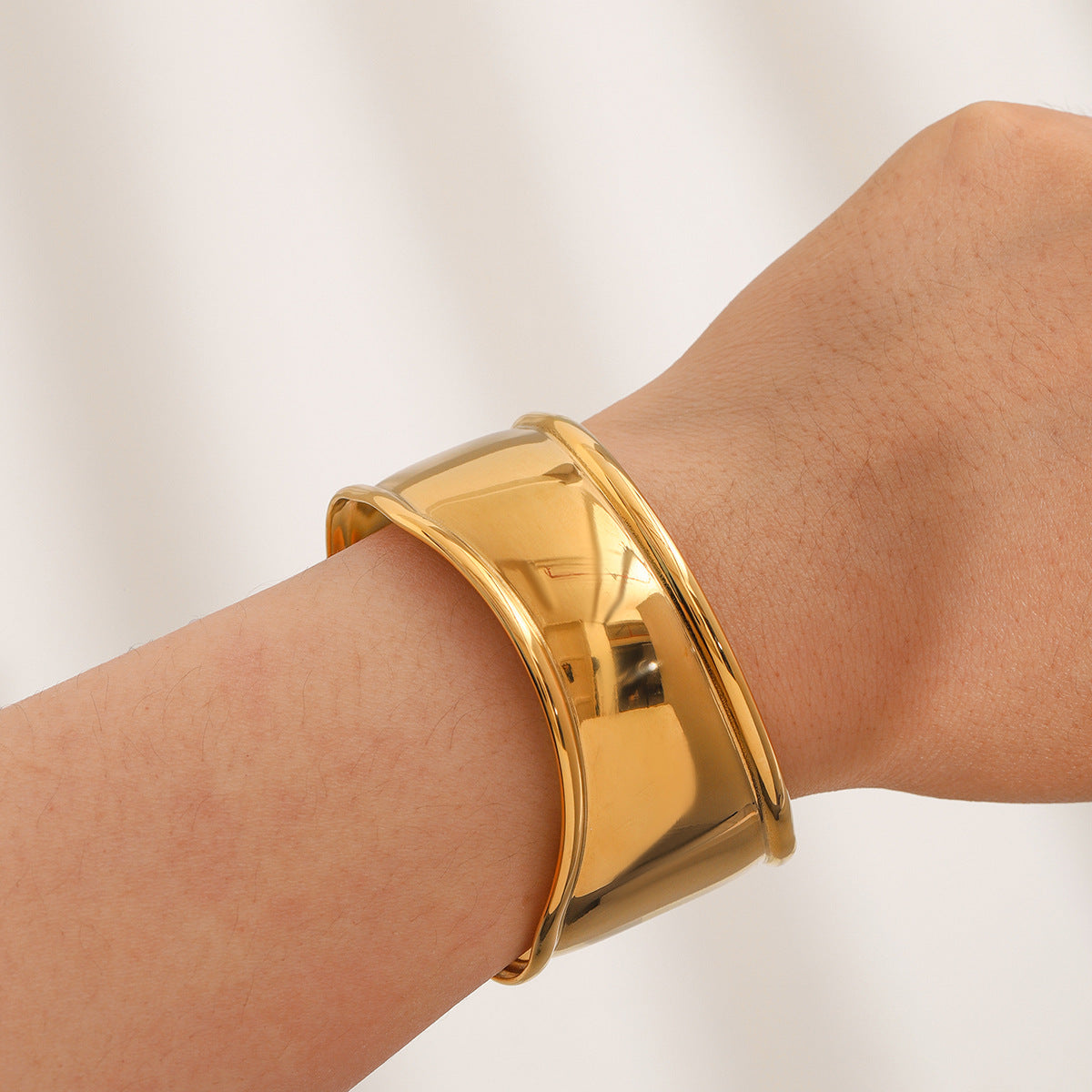 Sculptural Gold Wave Cuff