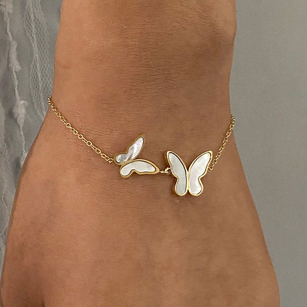 Elegant Butterfly Pearl Charm Bracelet