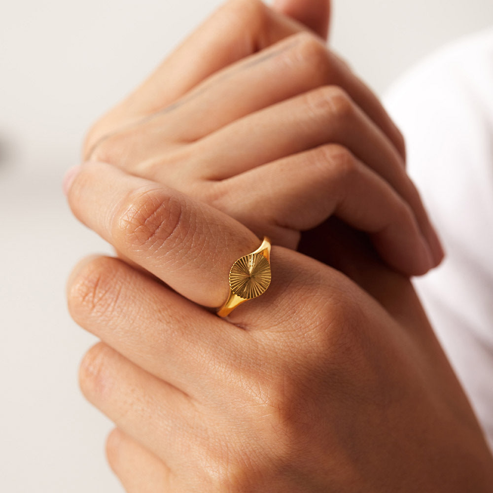 Cyna Radiant Gold Ring