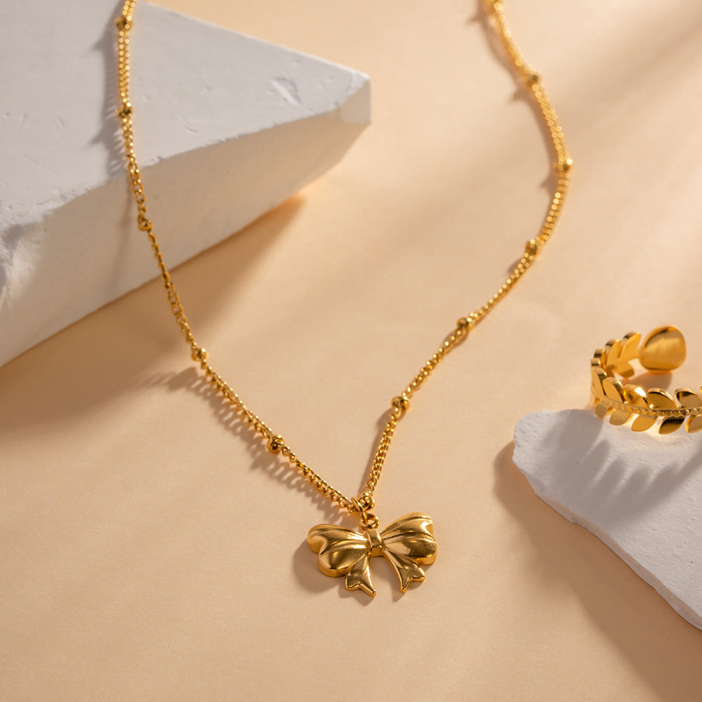 Elegant Ribbon Gold Necklace