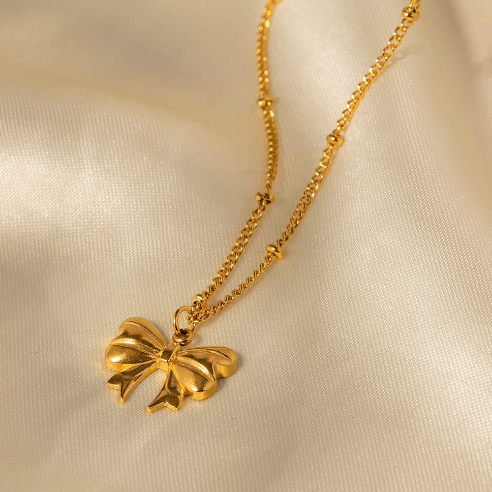 Elegant Ribbon Gold Necklace