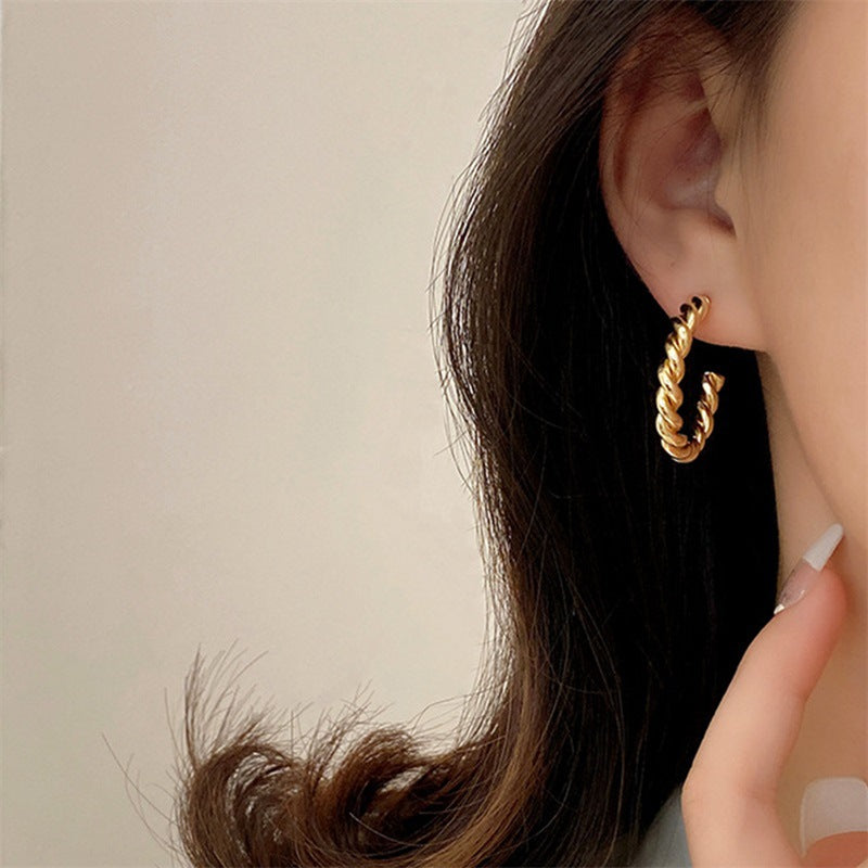 Elegant Gold Twist Earrings