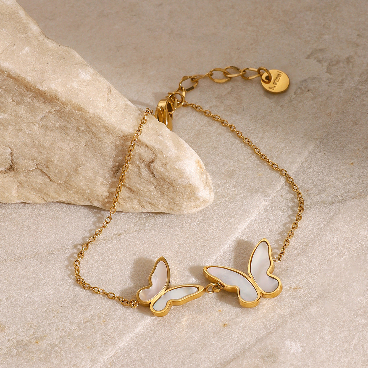Elegant Butterfly Pearl Charm Bracelet