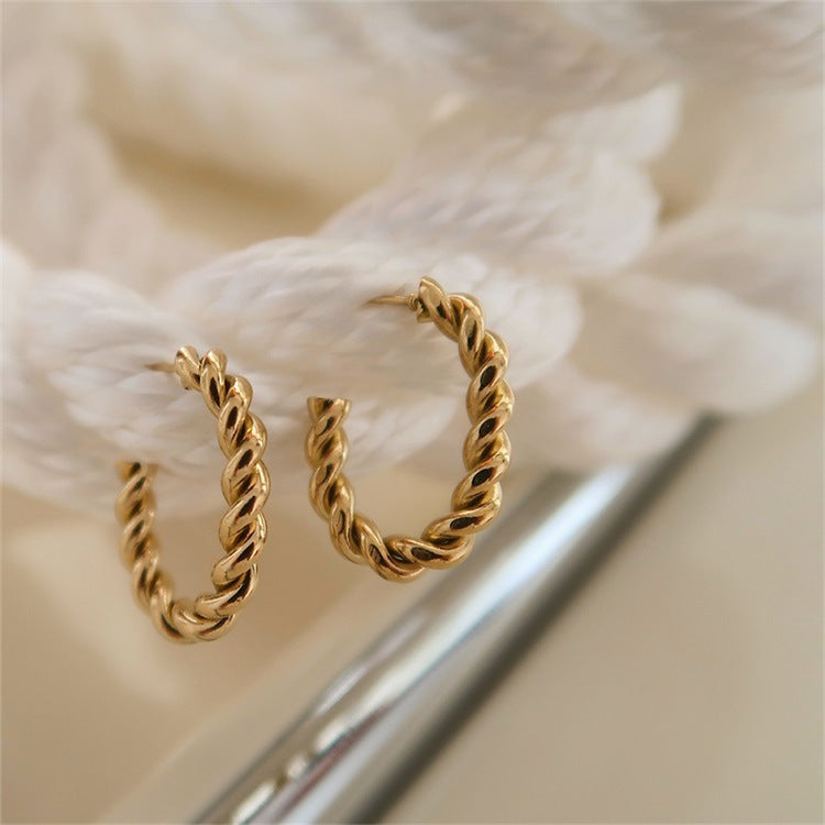 Elegant Gold Twist Earrings